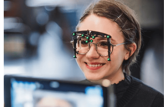 a-woman-with-glasses-looking-at-a-computer-screen Dry Eye