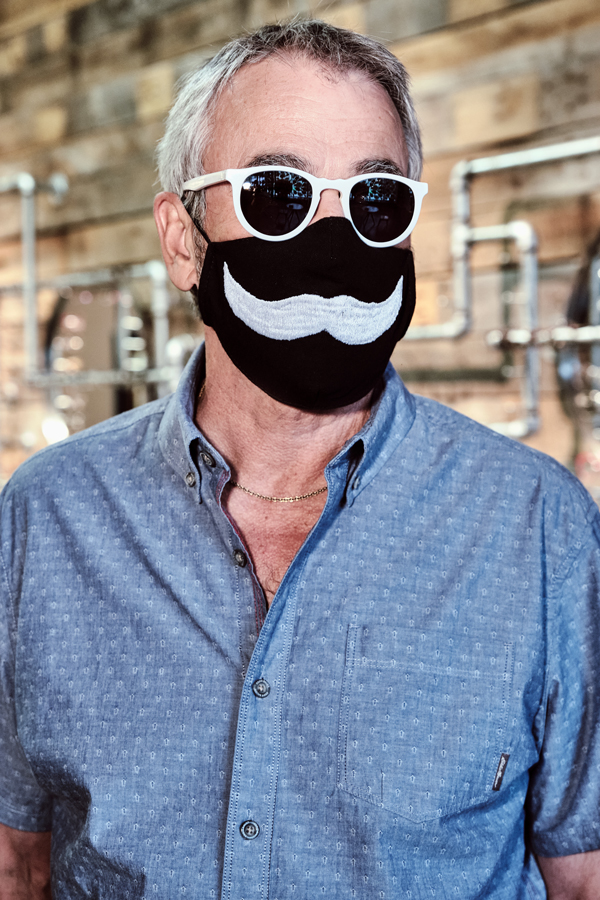 Man wearing designer sunglasses from Oscar Oglethorpe